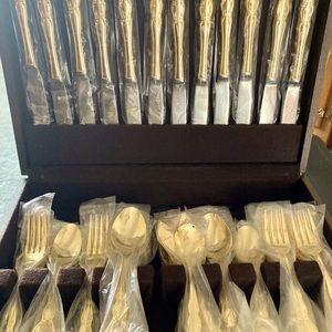 65 piece Royal Limited gold plated stainless flatware and storage case